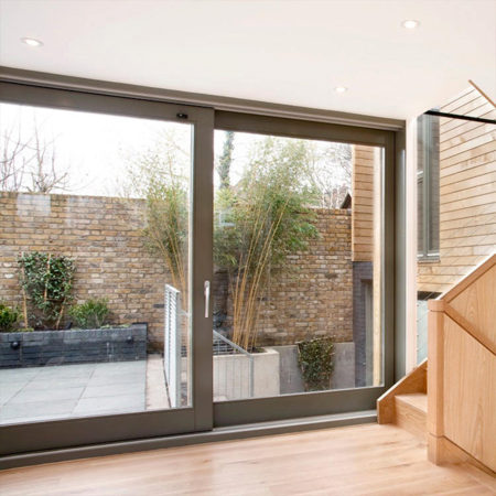 contemporary timber sliding doors new build