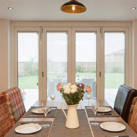 timber bifold doors in dining room