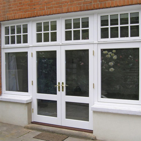 traditional timber french doors with side and fan lights and astragal bars