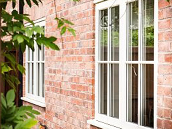 wooden casement windows with astragal bar design