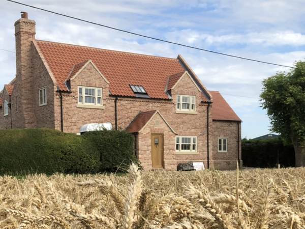 Walnut tree cottage is a self build project which features George Barnsdale timber windows and doors