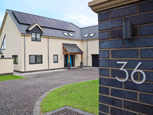 contemporary style new build with casement windows in dark grey