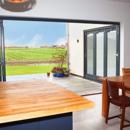 bifold doors opening out into the garden from the kitchen