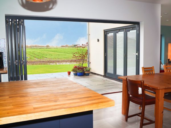 bifold doors opening out into the garden from the kitchen