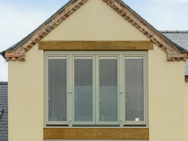 Juliet balcony with tilt and sliding doors