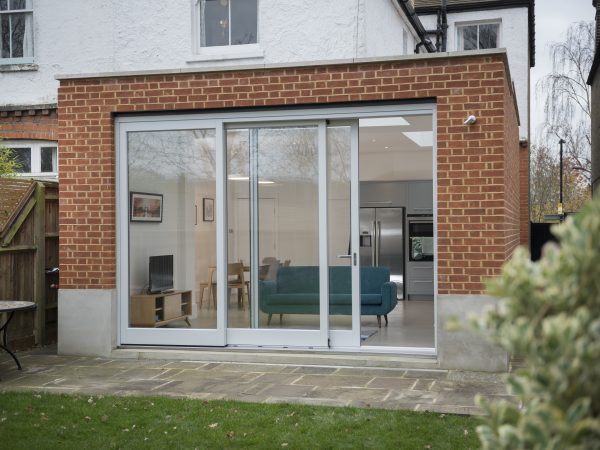 white sliding timber patio doors