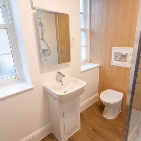 Bathroom at Florence boot hall Nottingham showing sliding sash windows with obscure frosted privacy glass.