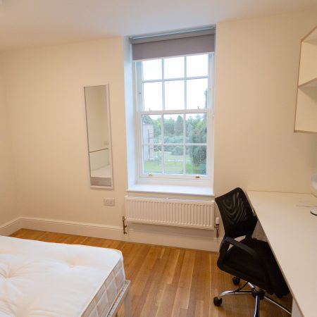 Sliding sash window in a student bedroom