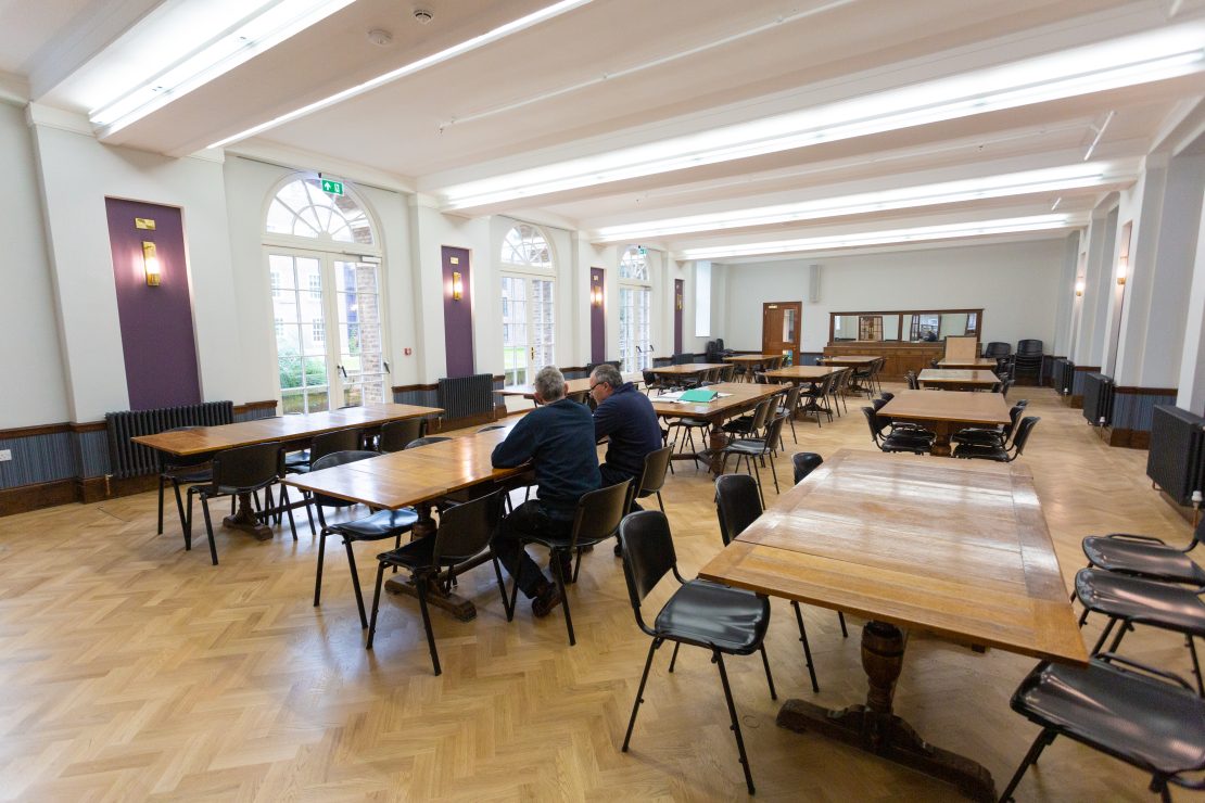 Dining hall with 3 sets of arch topped french door sets at Florence Boot Hall