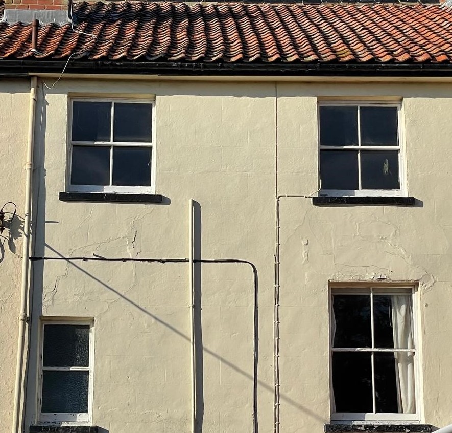 close up of old timber sliding sash windows